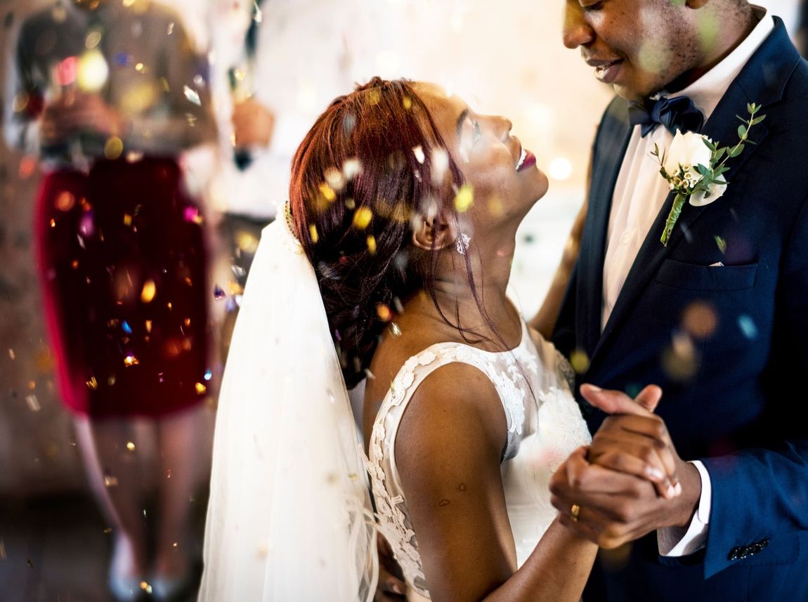 newlywed couple dancing
