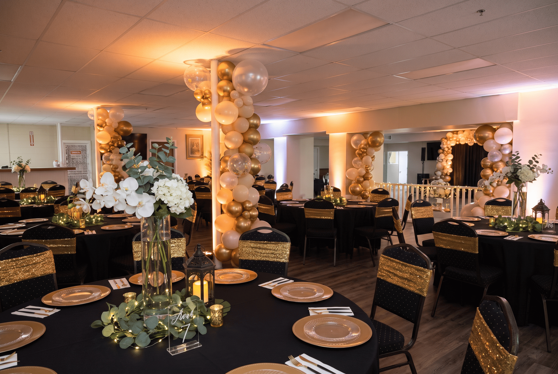 Banquet hall with black and gold table