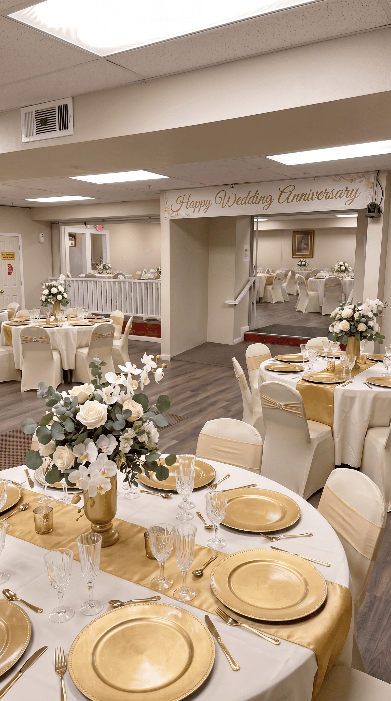 Banquet hall with gold and white table