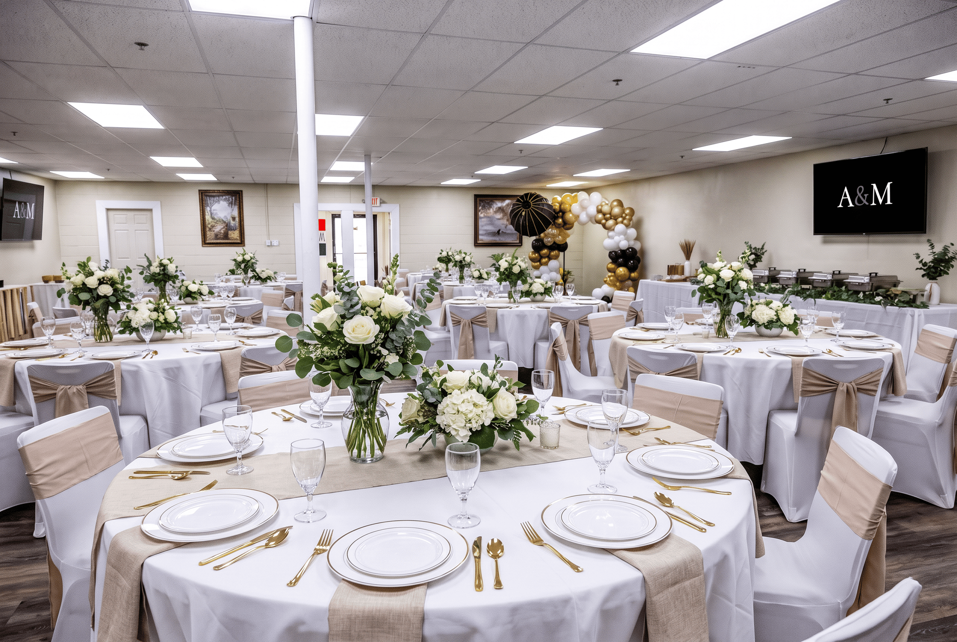 Elegant banquet hall with round white clothed tables