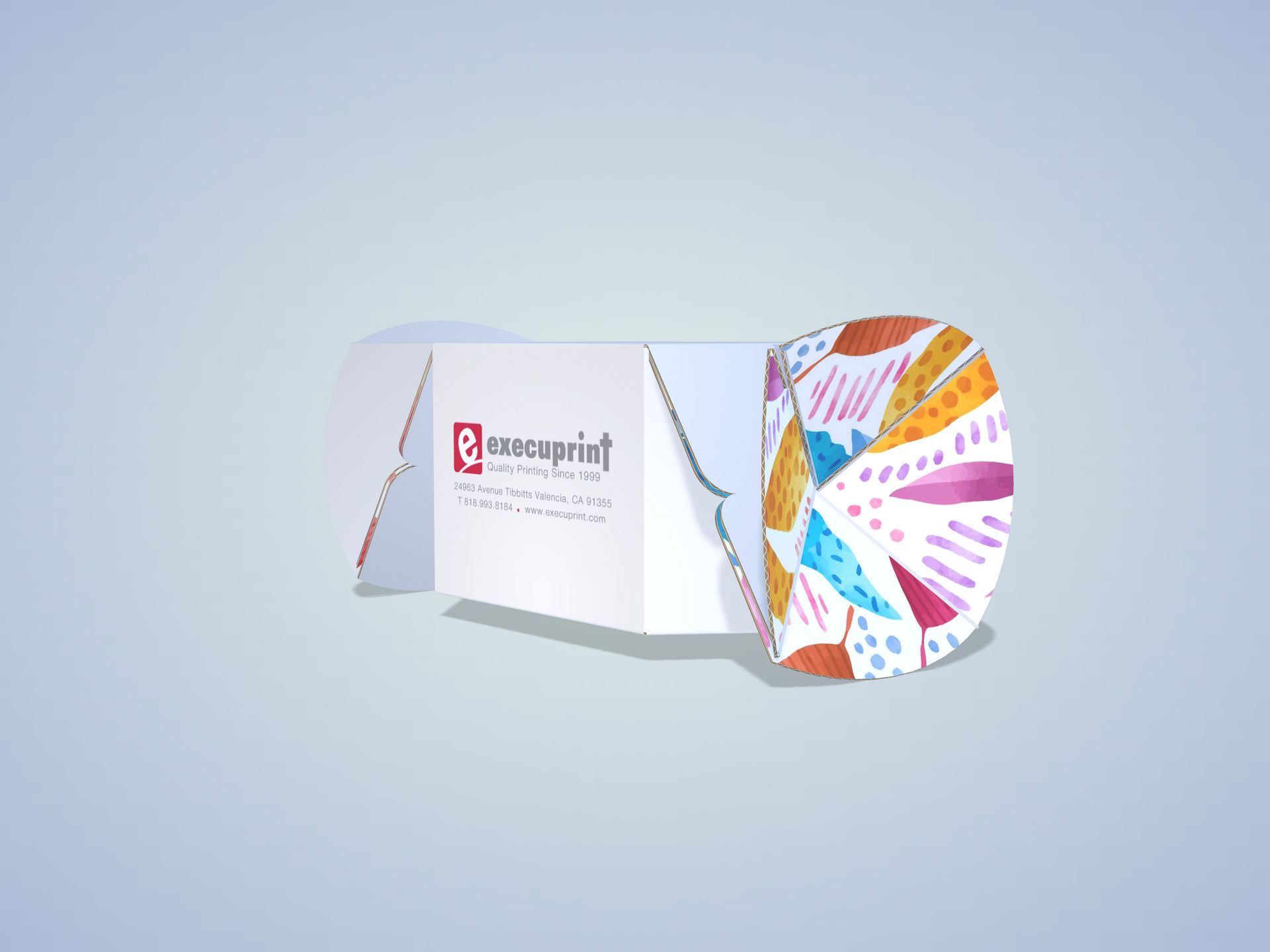 Three-panel brochure with company logo, folded open. One panel has a colorful abstract design.