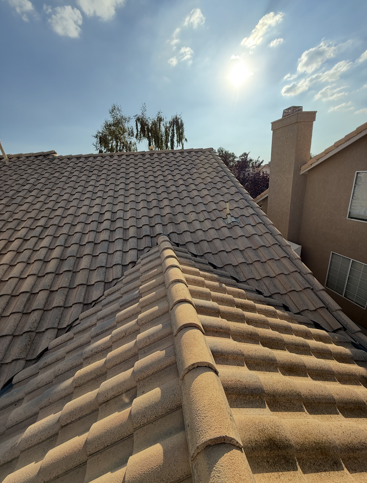 Roofers working on a rooftop