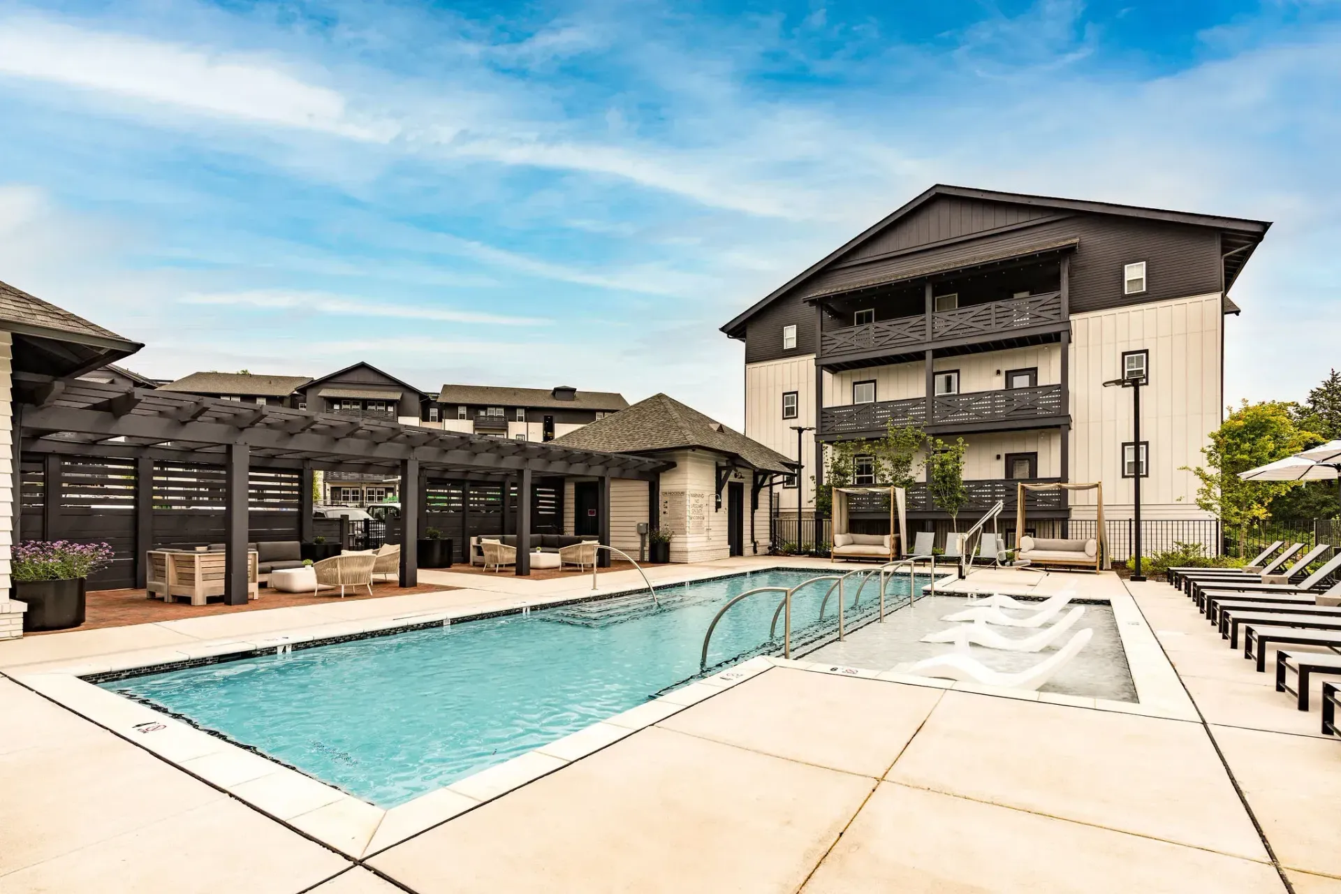 Swimming pool area on a gorgeous afternoon at Livano Trinity.