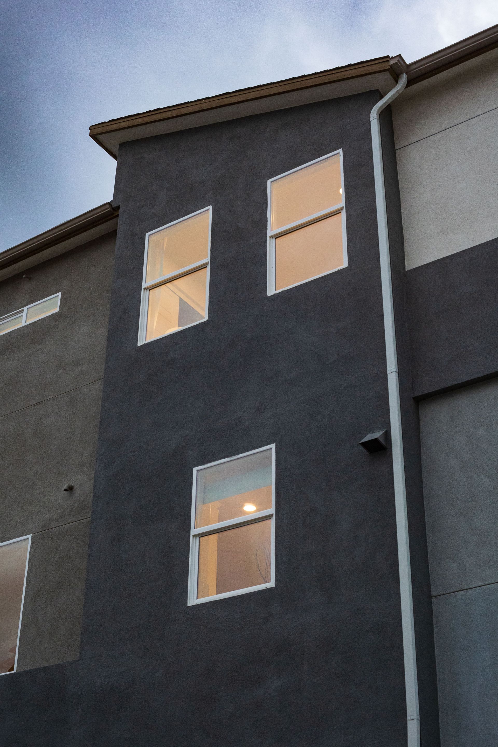 Dark grey house with modern windows