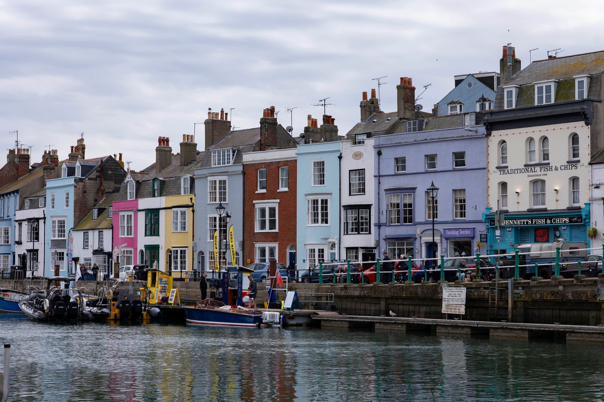 Colourful terraced houses along a seafront