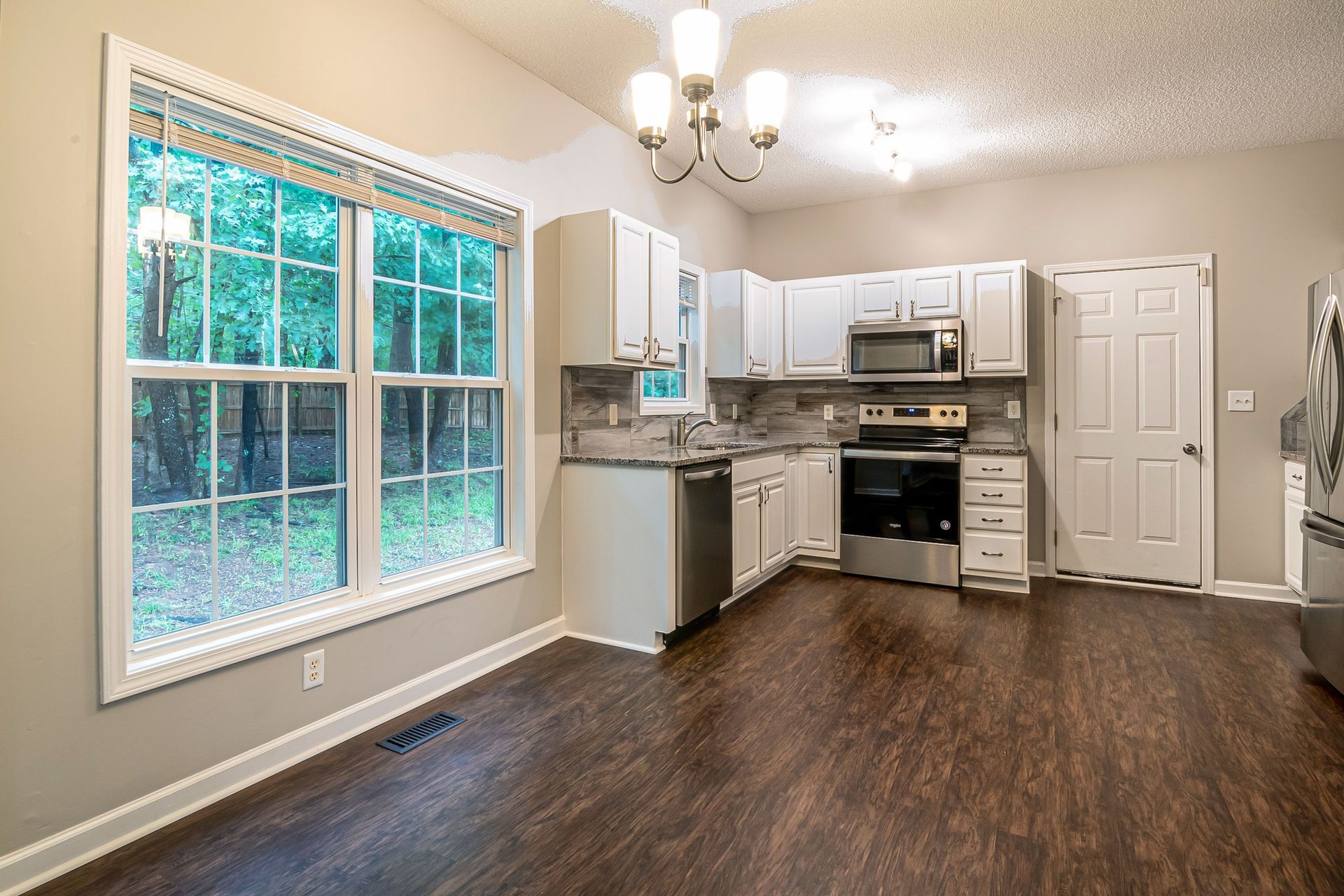 Modern kitchen with a wood-effect floor