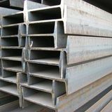 Stacked silver metal I-beams or structural beams with hollow channels, shown close up.