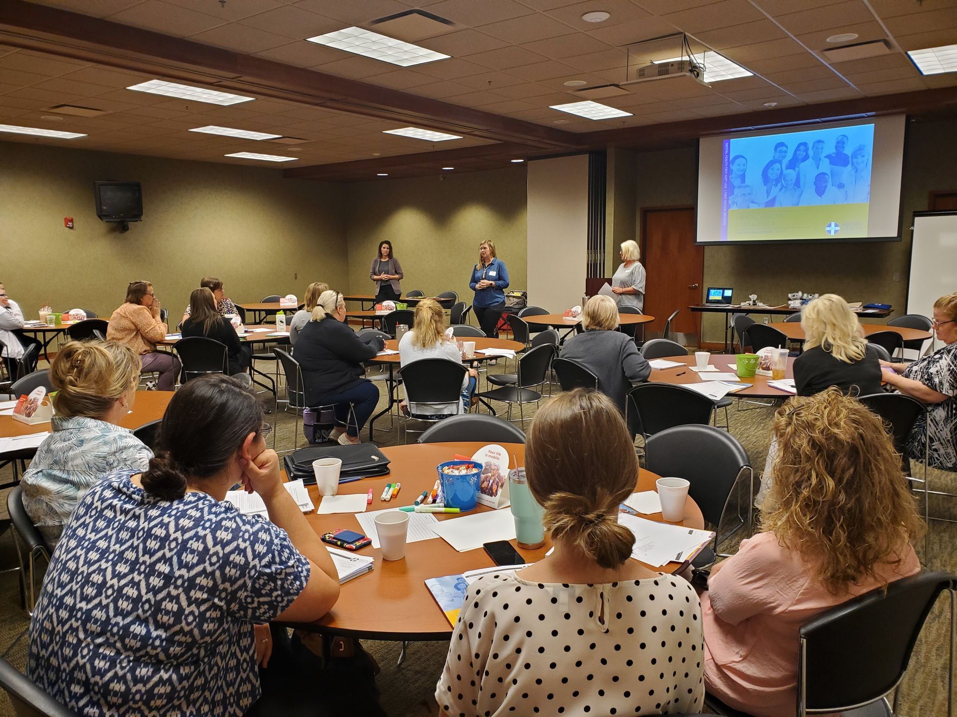 Group of people training in an education session.