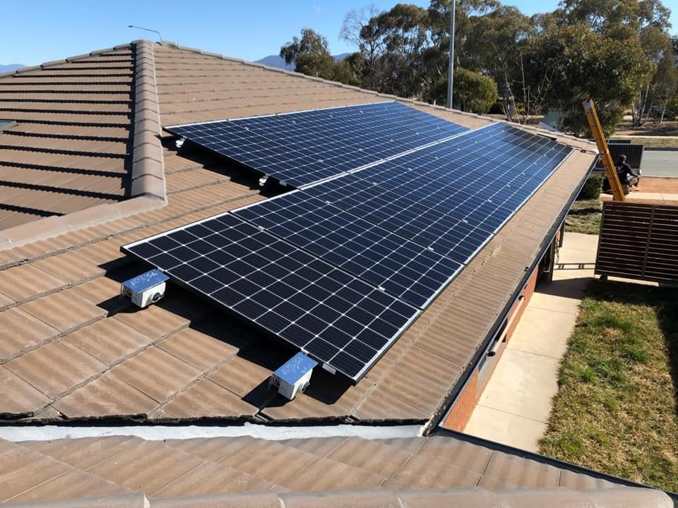 A Roof With a Lot of Solar Panels on It — Spot On Solar International in Cessnock, NSW