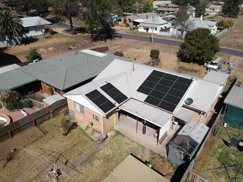 An Aerial View of a House With Solar Panels on the Roof — Spot On Solar International in Beresfield, NSW