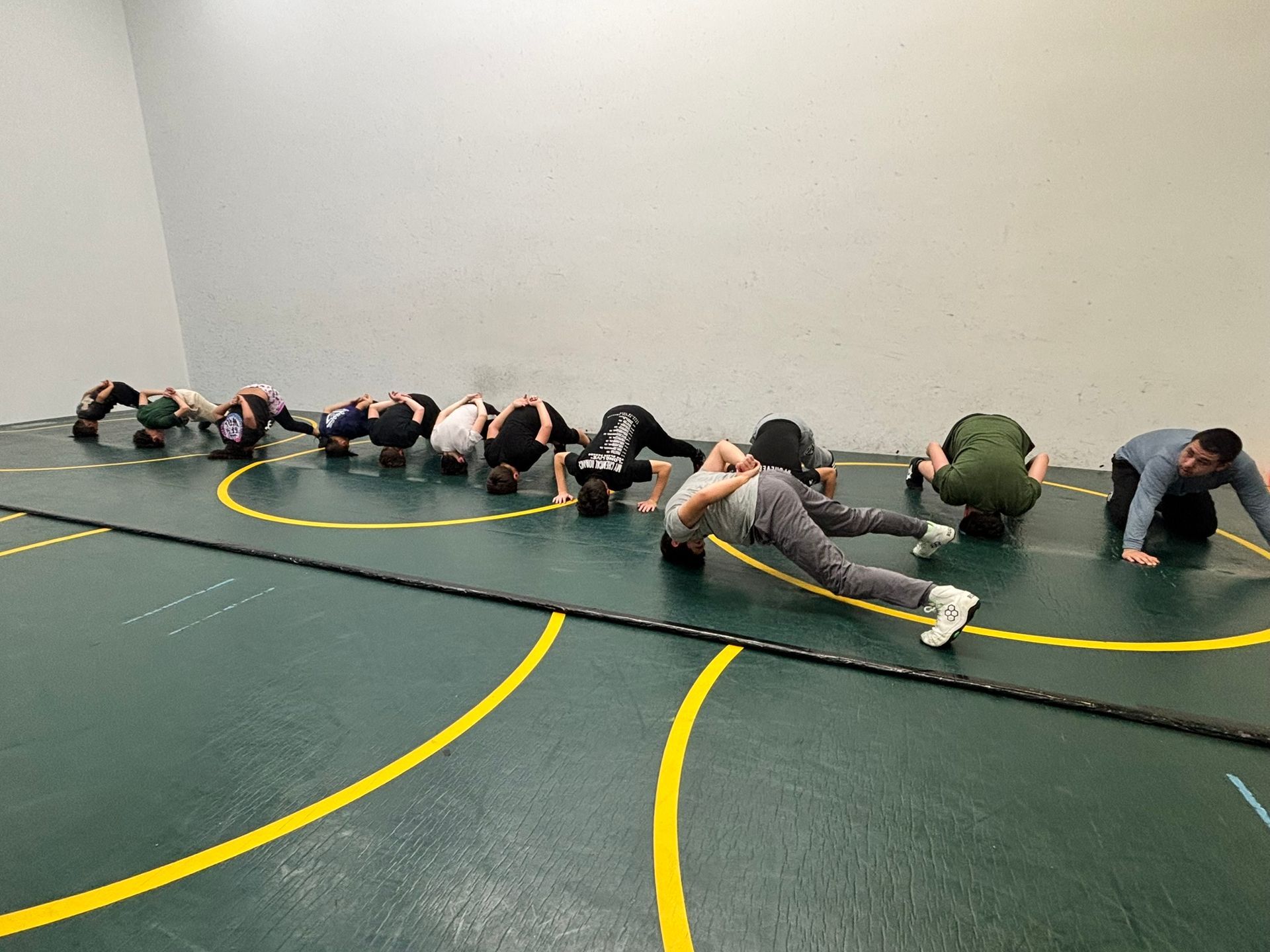 Wrestlers stretching 