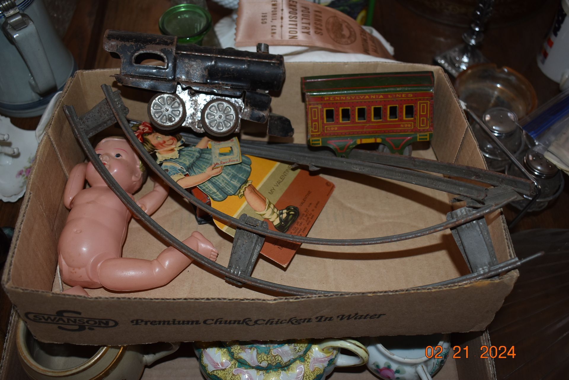 Antique toys including a rocking horse and a train