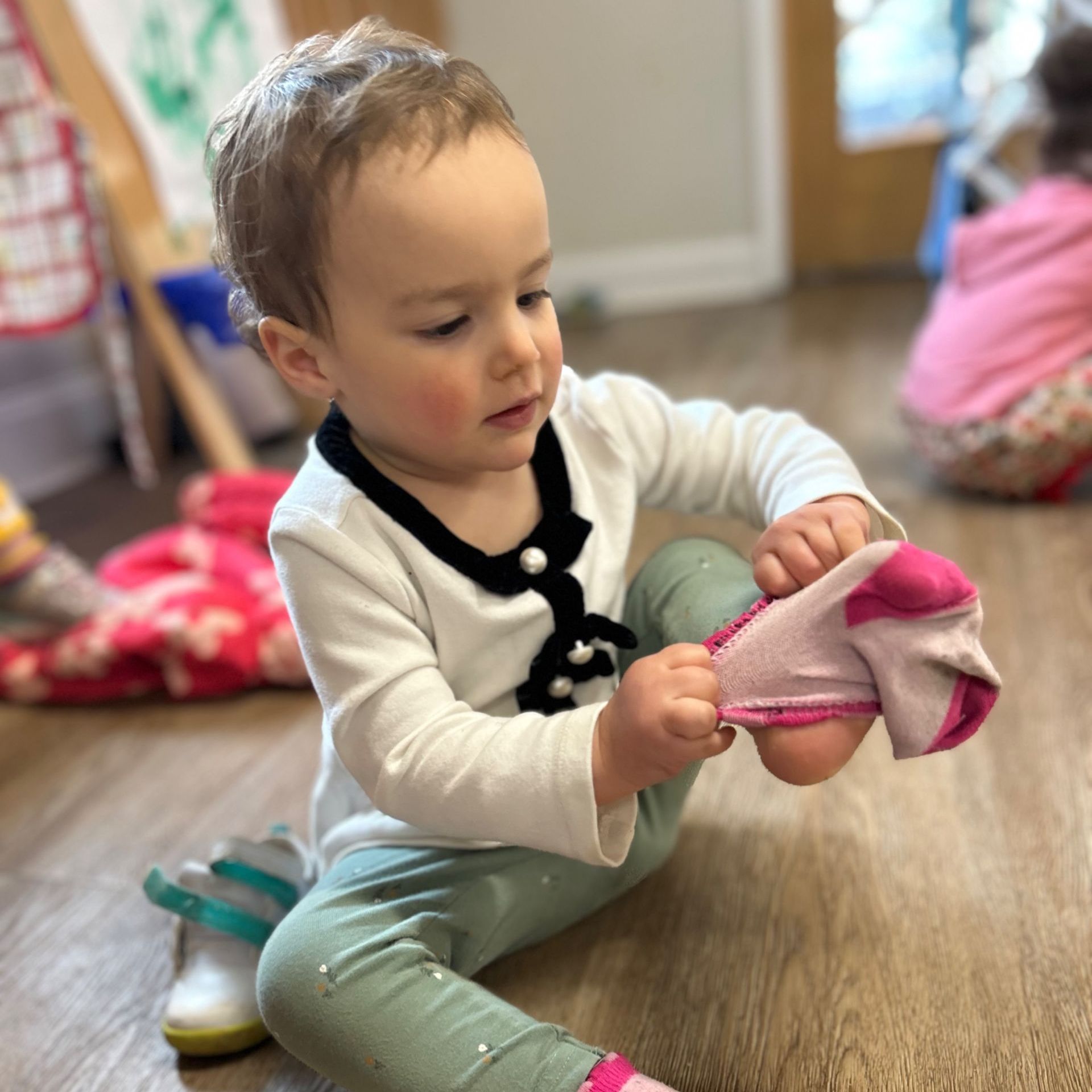 Montessori child looking a the camera