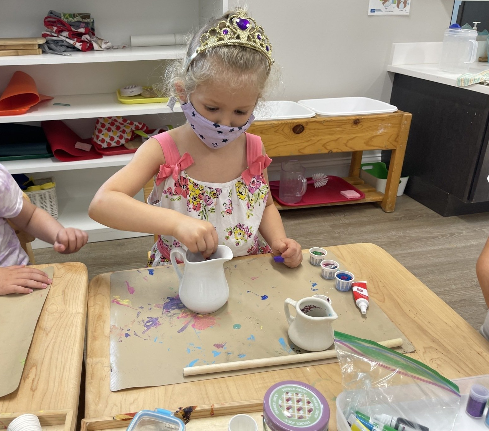 Montessori child working on an art project