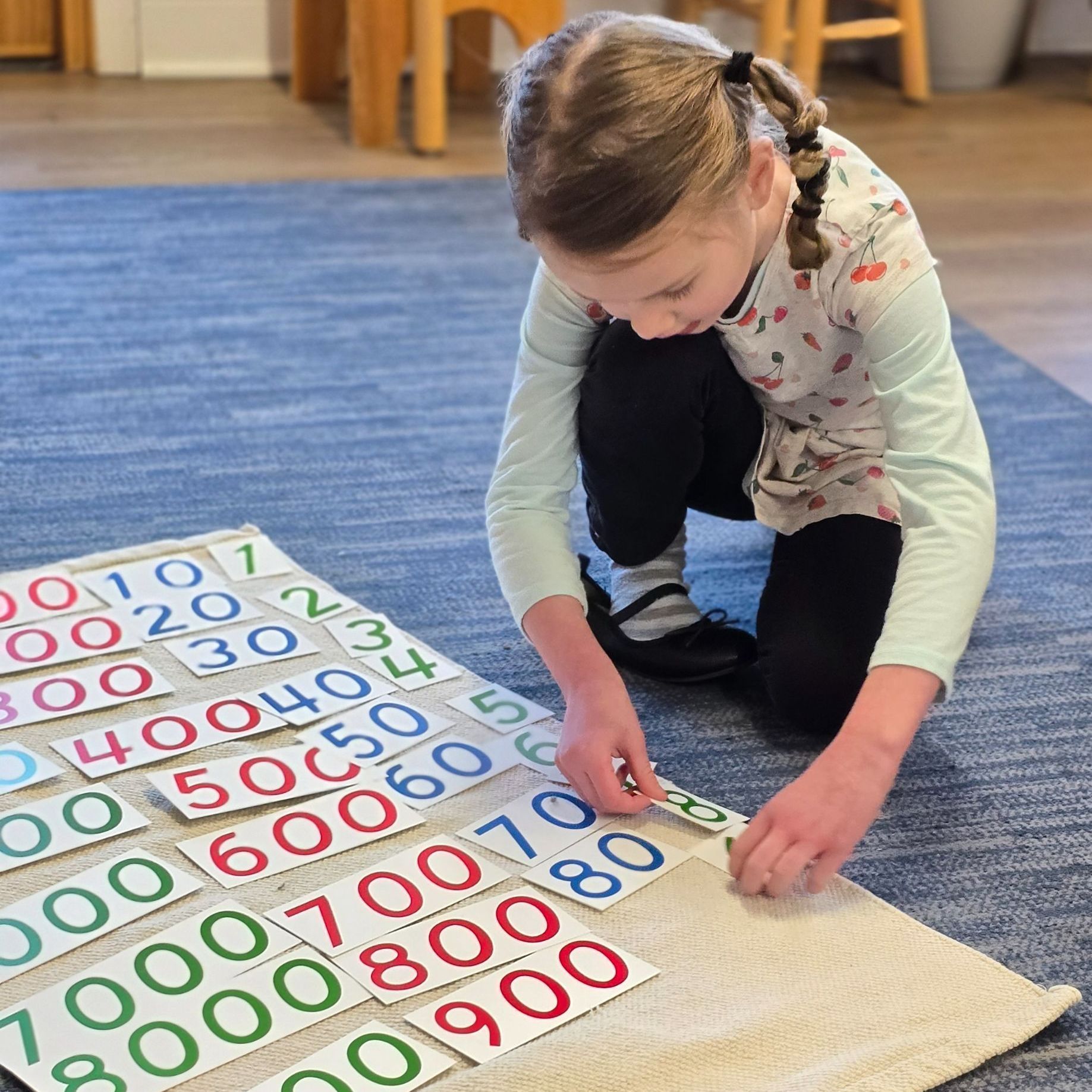Montessori child working in the classroom