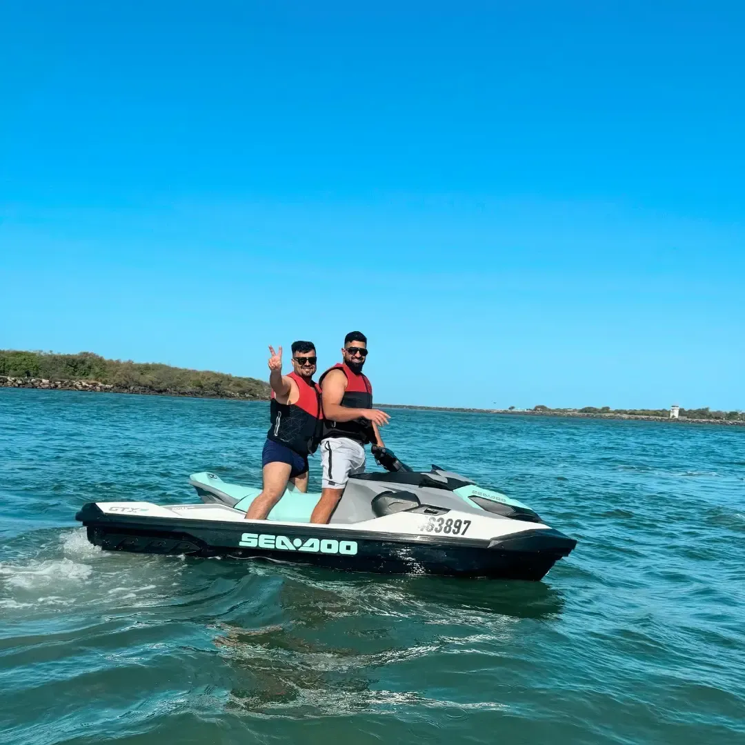 Surfers Paradise Jet Ski - two friends who rented a jet ski from Gold Coast Jet Ski having fun out on the water Surfers Paradise Jet Ski - two friends who rented a jet ski from Gold Coast Jet Ski having fun out on the water