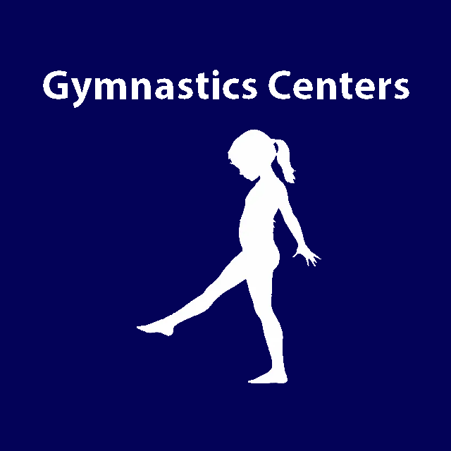 Gym class on blue mats, people stretching on the floor and a coach assisting in a gymnasium