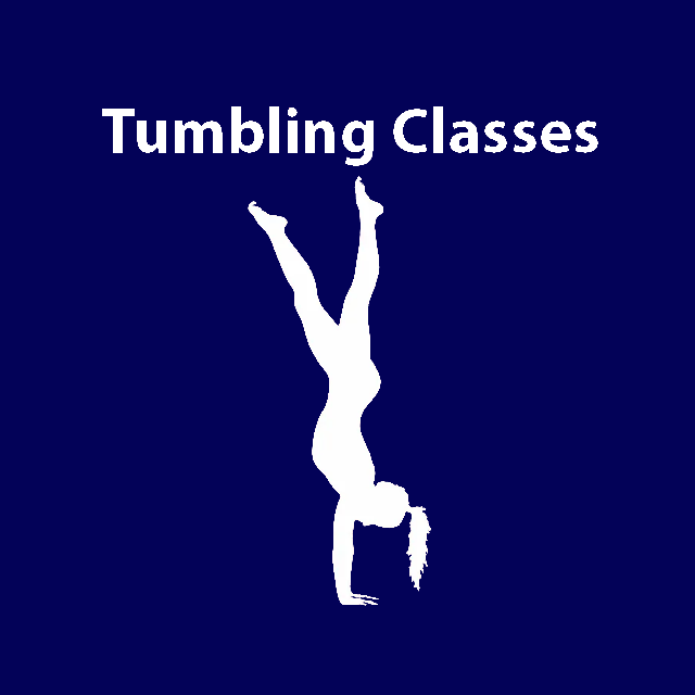 Gymnasts stretching on blue mats in a gym, seated in a line during practice