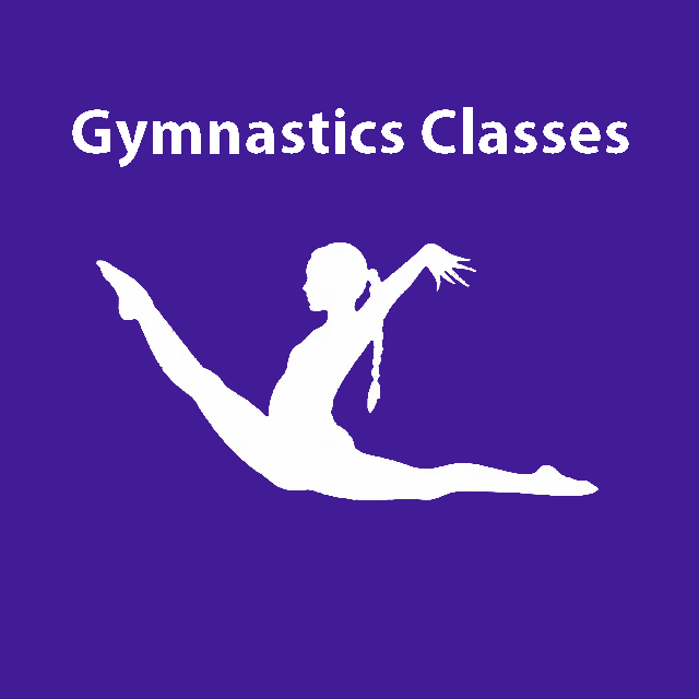 Gymnast performing a backbend on a blue mat in an indoor gymnastics gym