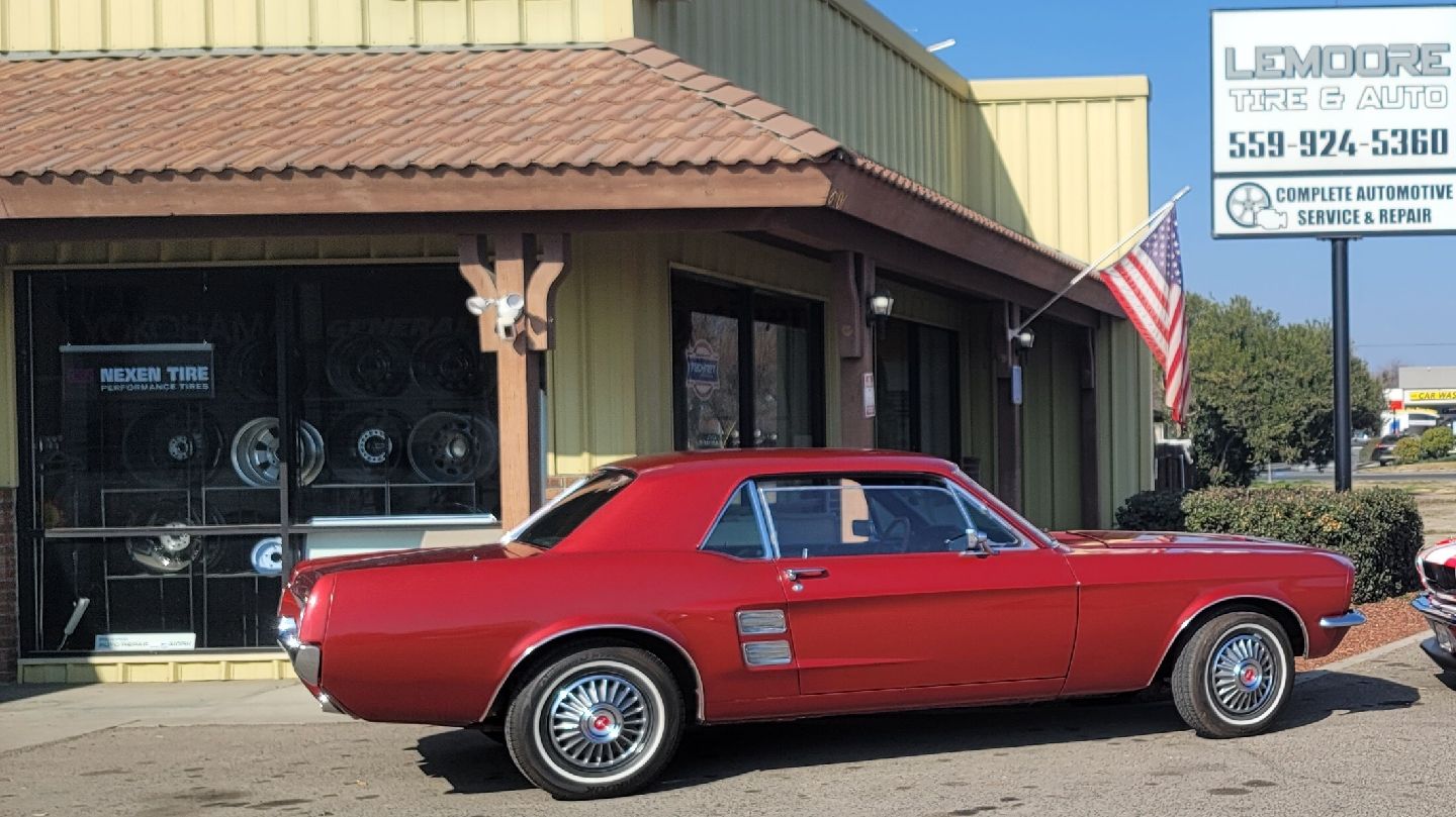Mustang & exterior of shop | Lemoore Tire & Auto