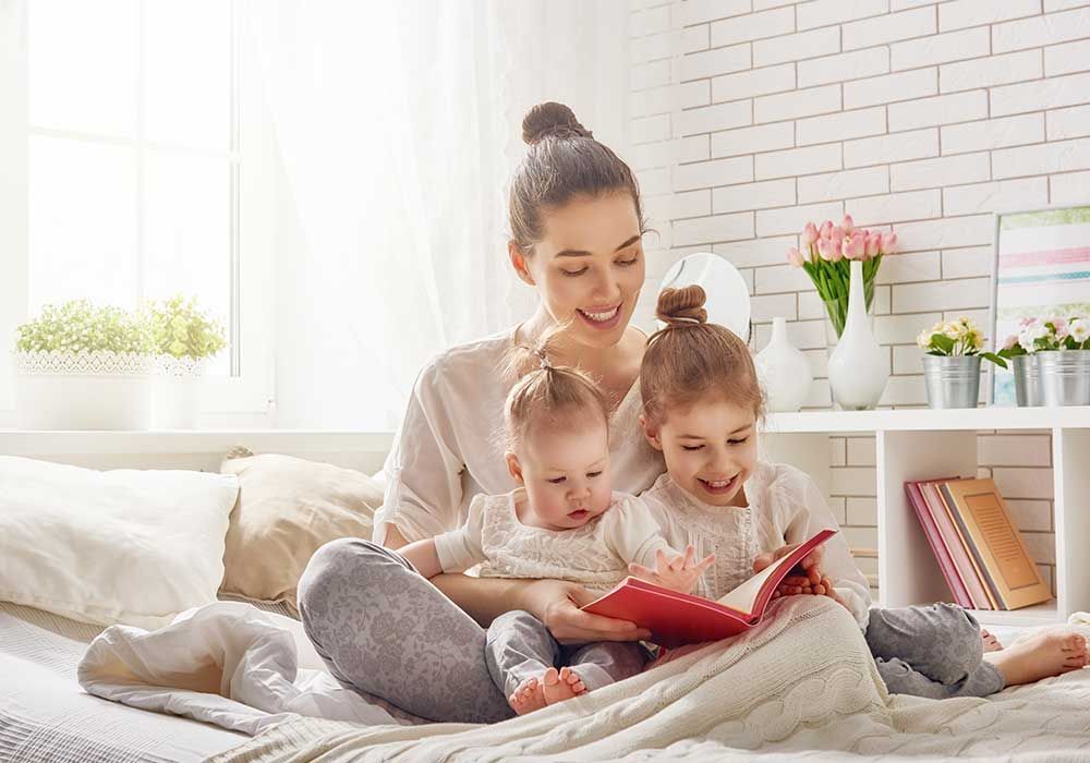 Family Reading a Book