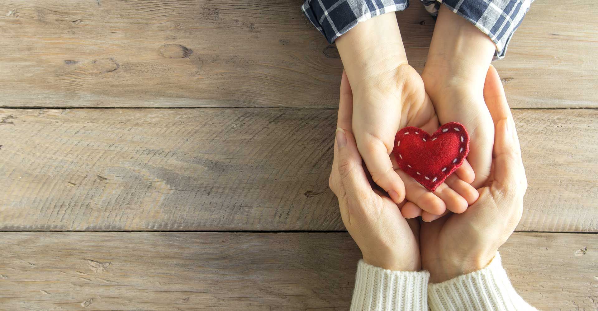 Hands Holding a Heart