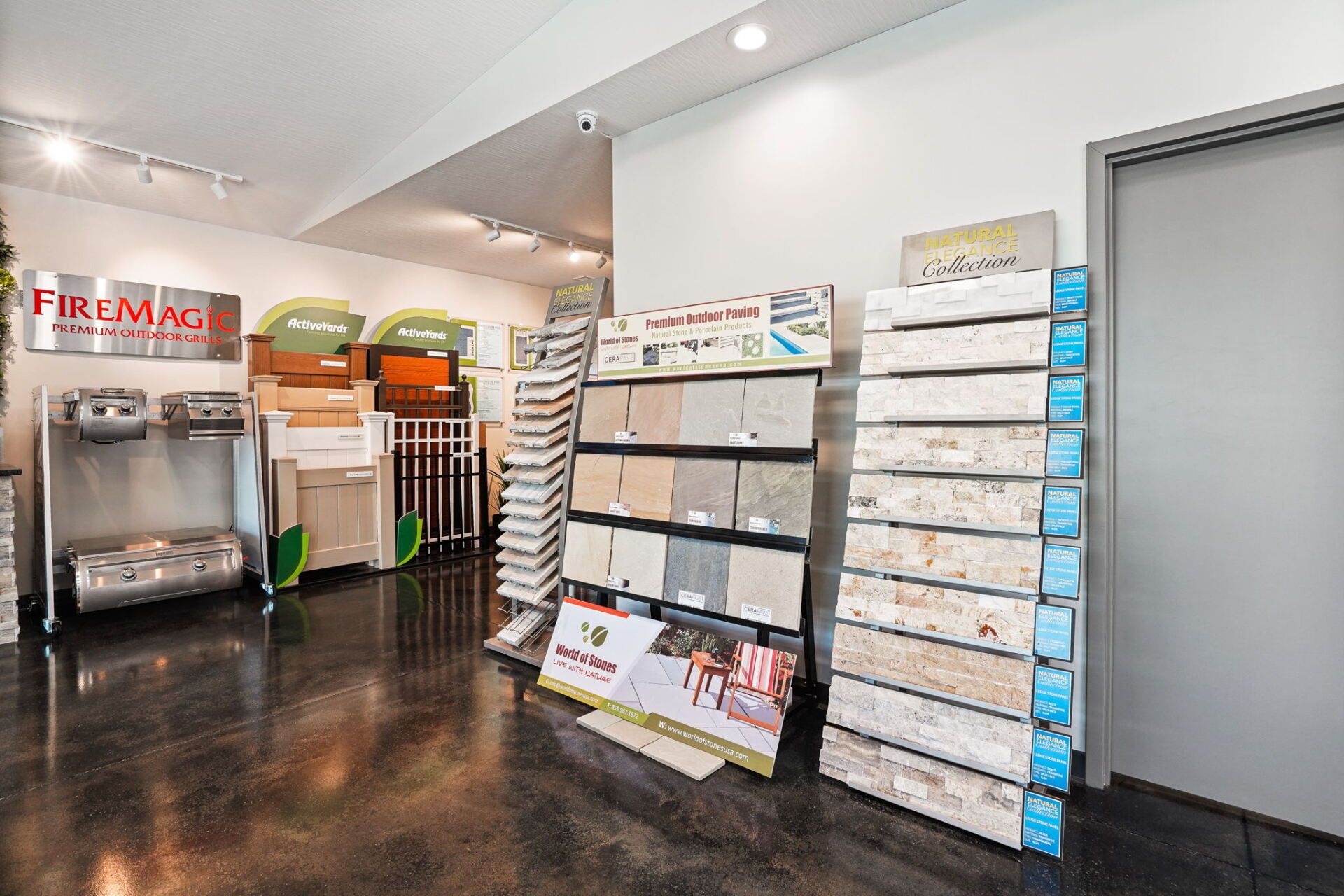 Fire-Mat showroom with sample displays, shelving, and stacked product samples in a bright office
