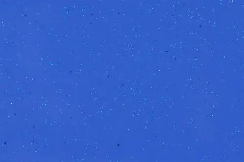 Blue background with scattered white speckles resembling stars or dust