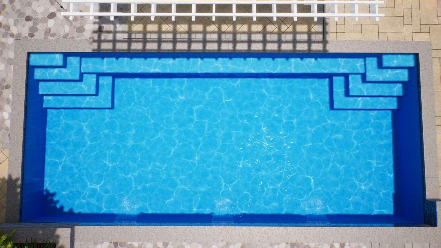 Rectangular blue swimming pool with stepped corner ledges beside a tiled deck