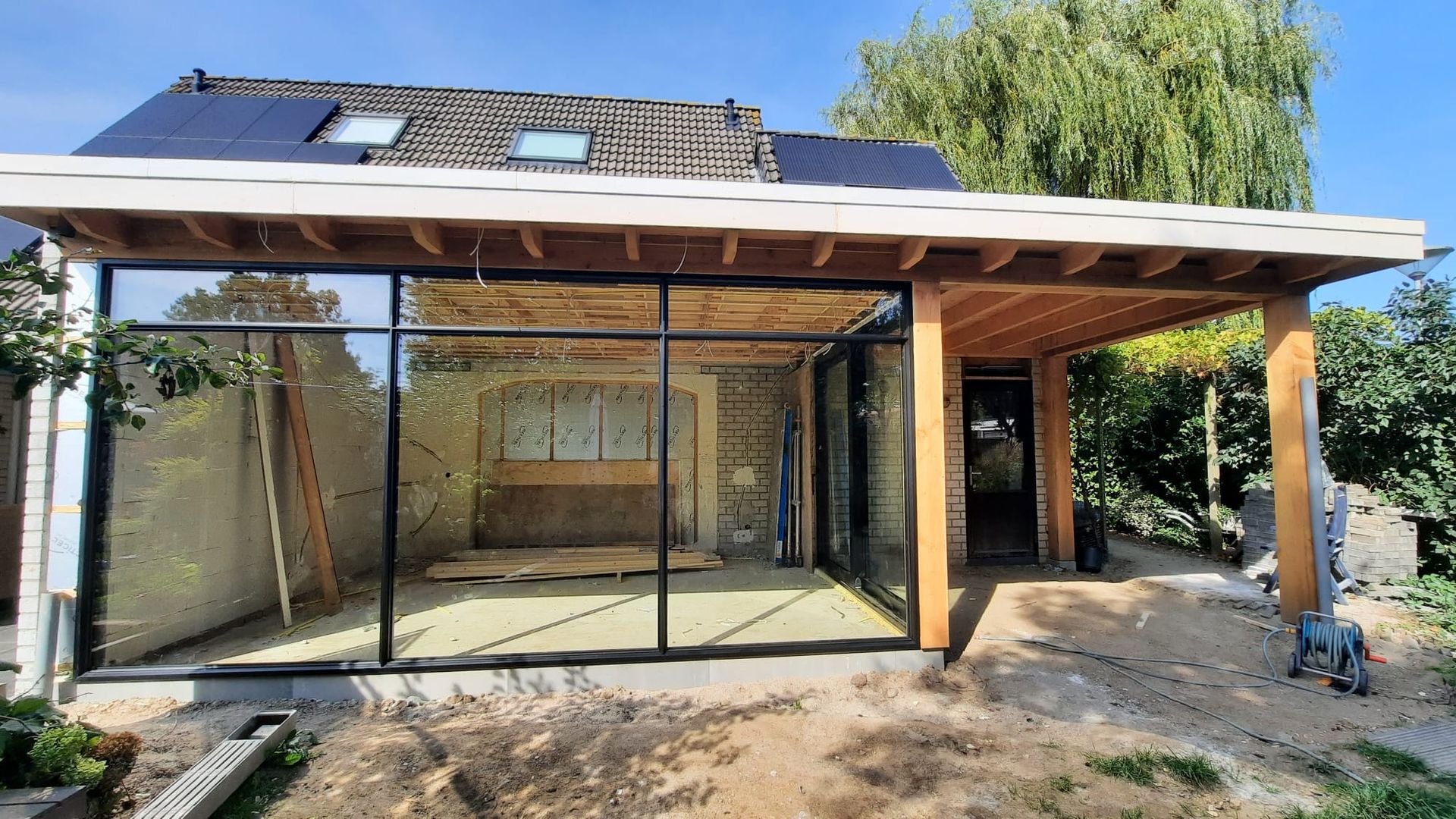  Verandaverbouwing en aanbouw uitbreiding.