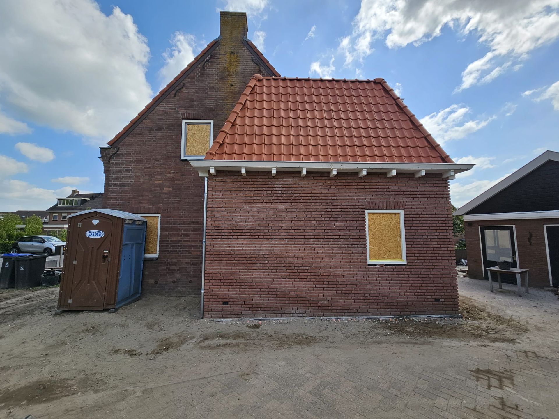 Achtergevel woning met nieuw dak en dakkapel 