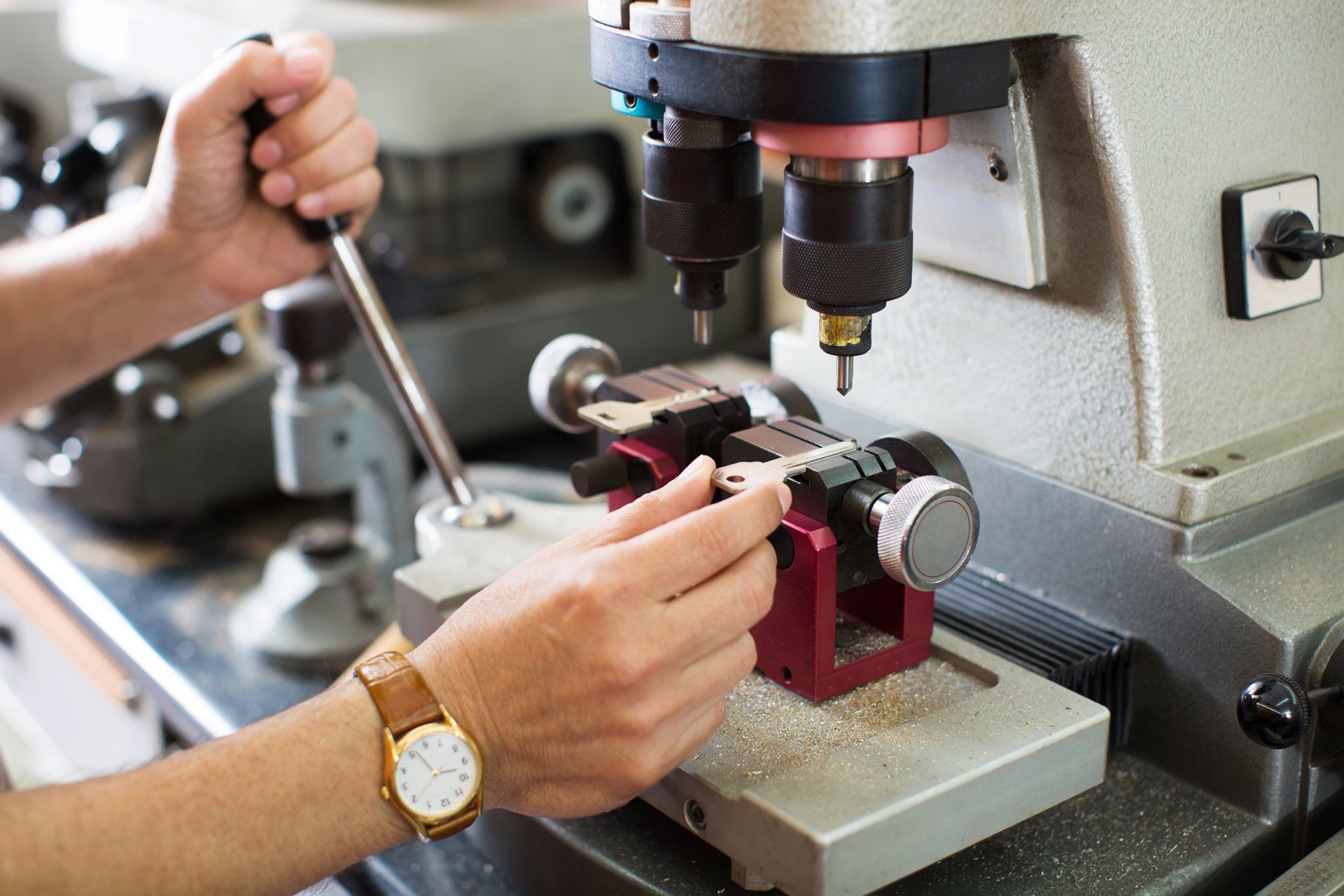 Locksmith Making a Key — Colorado Springs, CO — Henley’s Key Service Inc.