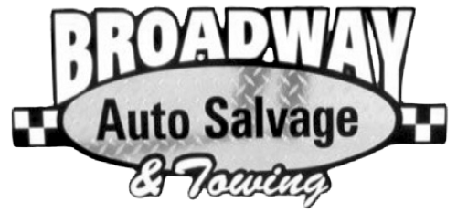 Broadway Auto Salvage & Towing logo in black and white with checkered accents