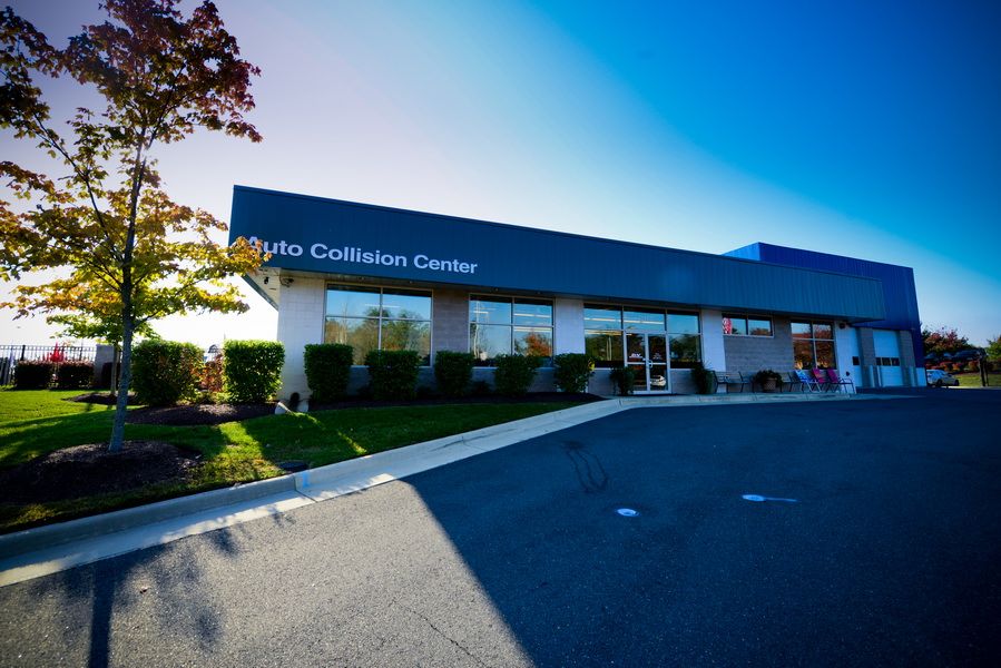D&V Autobody Customer Center Exterior At Sunset | D&V Autobody