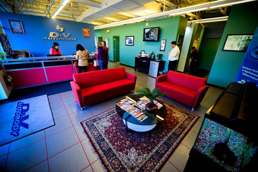 D&V Autobody Lobby Area With Red Sofas | D&V Autobody