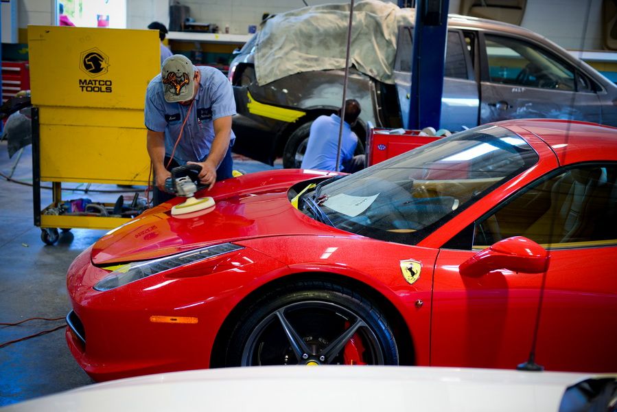 Red Ferrari Being Serviced Inside Workshop | D&V Autobody