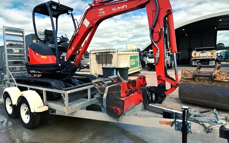 Trailer-mounted Kubota mini excavator ready for excavation projects in Sunshine Coast