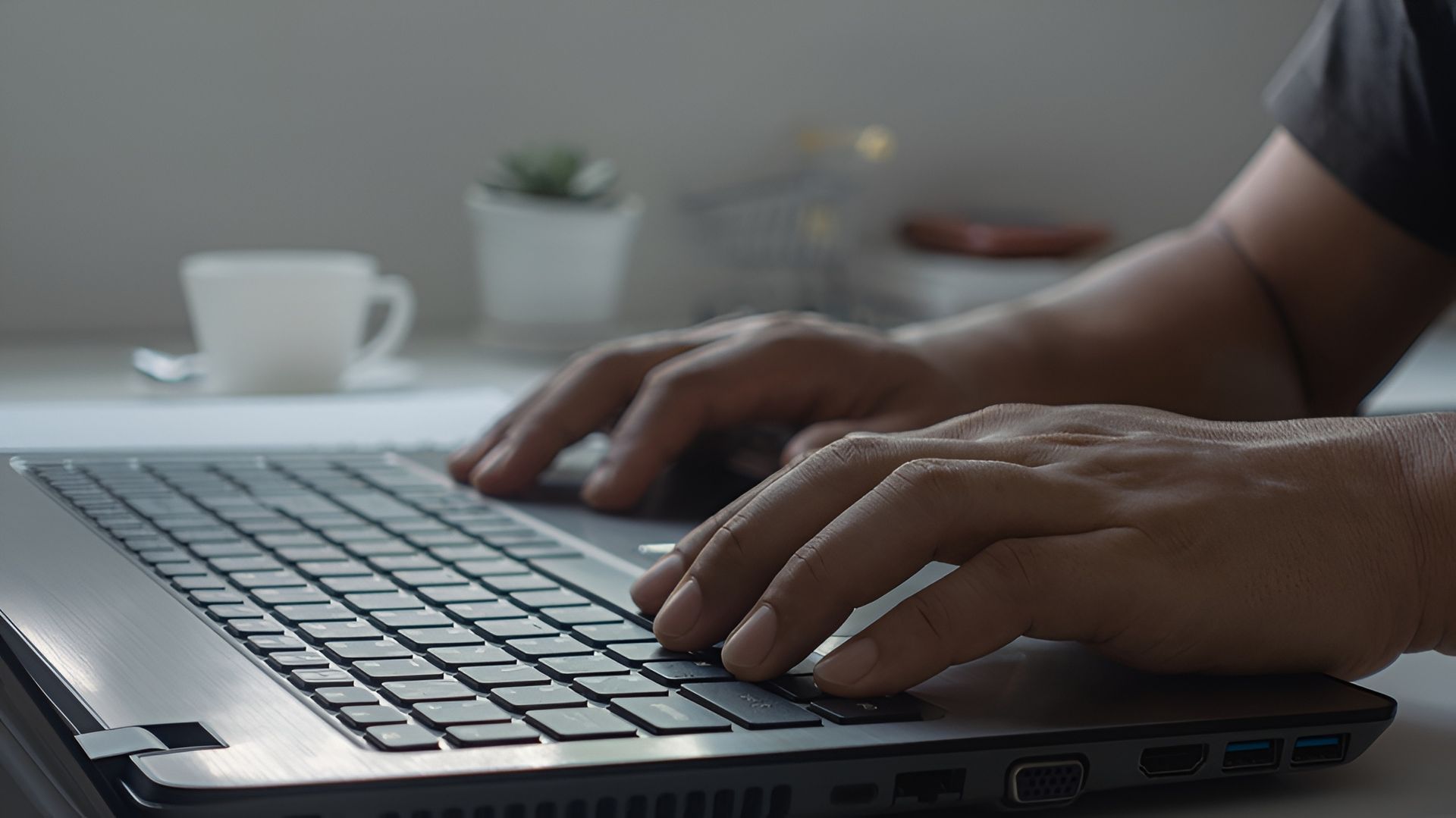 Hands Typing on a Laptop Keyboard — Allquip Rentals Pty Ltd in Cooroy, QLD