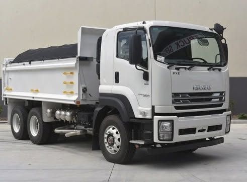 White Isuzu Tipper Truck on a Plain Studio Background — Allquip Rentals Pty Ltd in Cooroy, QLD