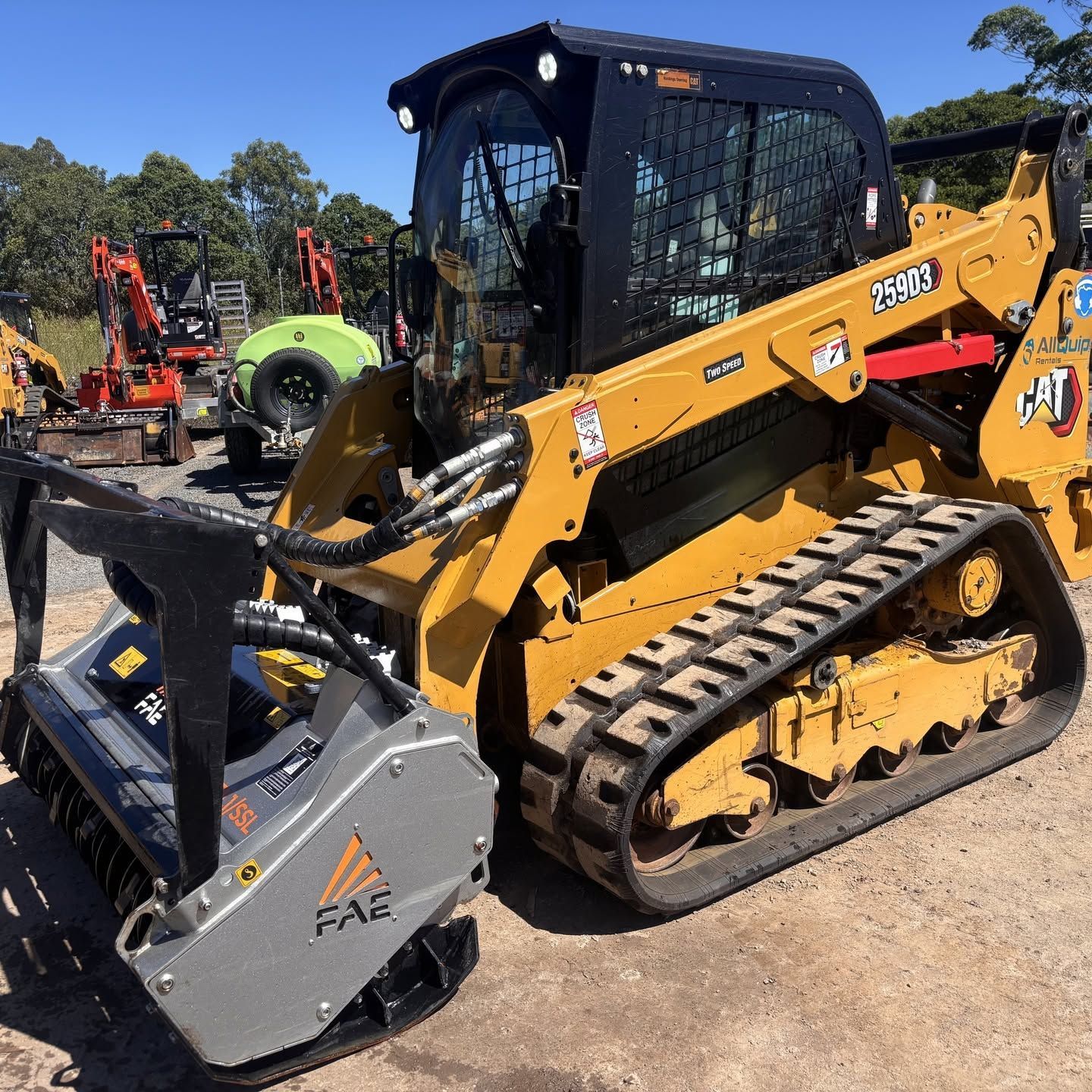 Tracked posi track with mulching attachment for posi track hire in Sunshine Coast