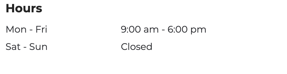 A sign that says hours mon - fri 9:00 am - 6:00 pm sat - sun closed