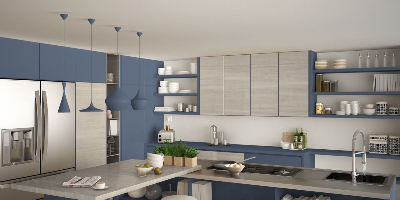 A modern kitchen with blue cabinets and white countertops.
