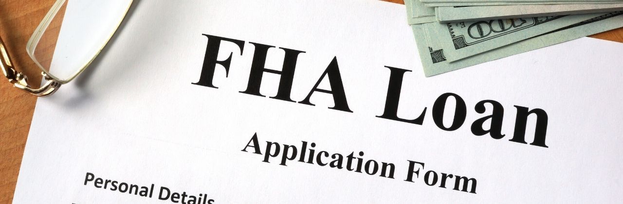 FHA loans application form with money on it | Home Loans in Roseville, CA