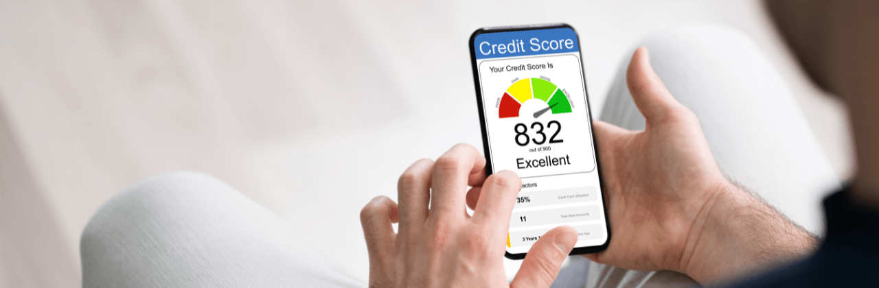 A person is using a cell phone to check their credit score.