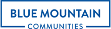 Blue Mountain Communities logo with blue text on a blue background. The text reads 