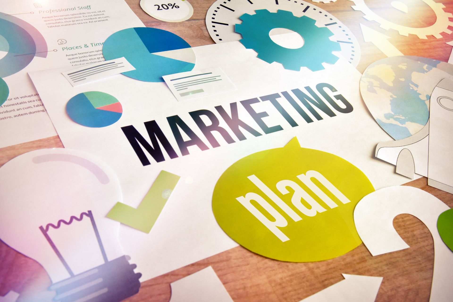 A table with a sign that says marketing plan on it.