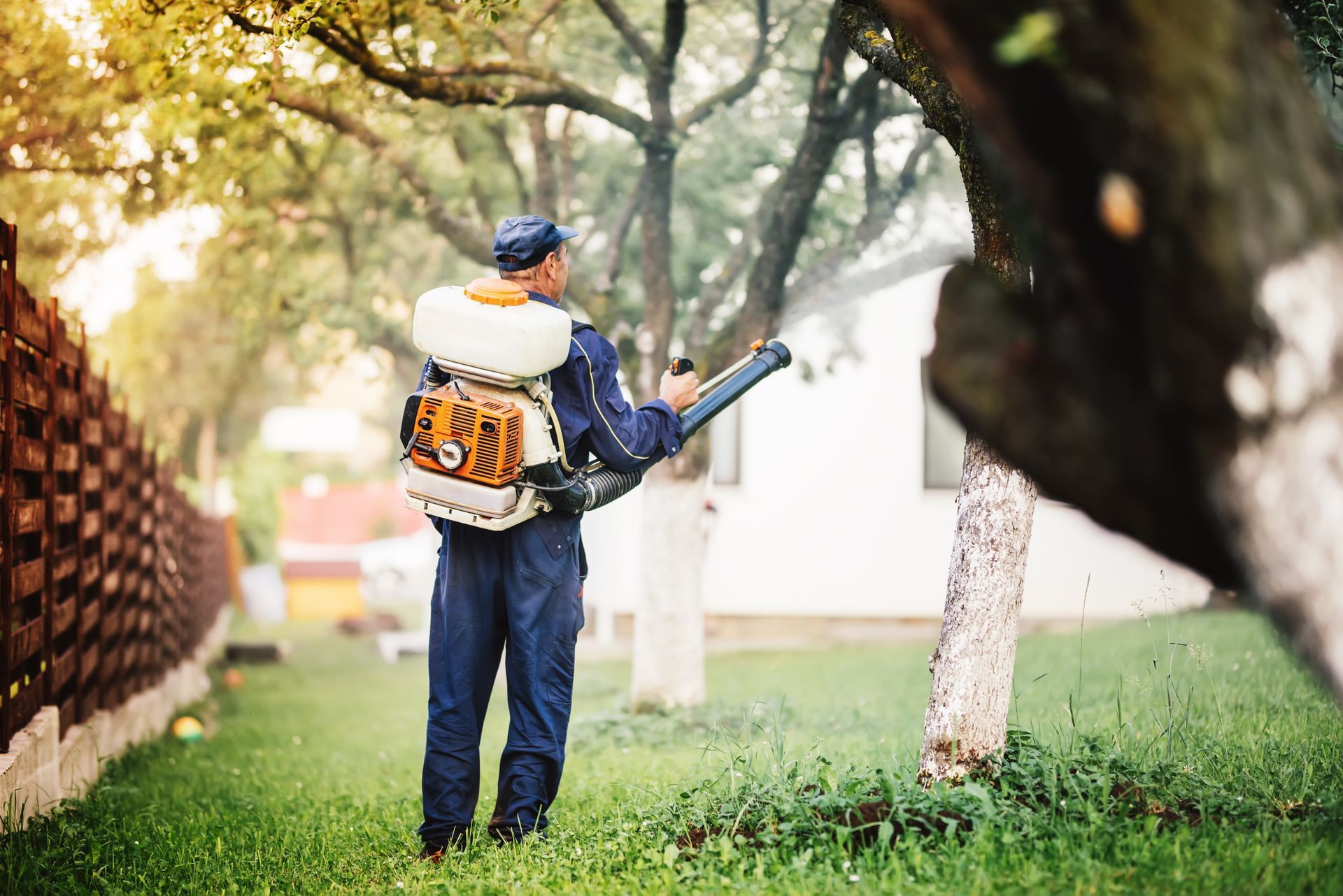 Farmer spraying pesticide.