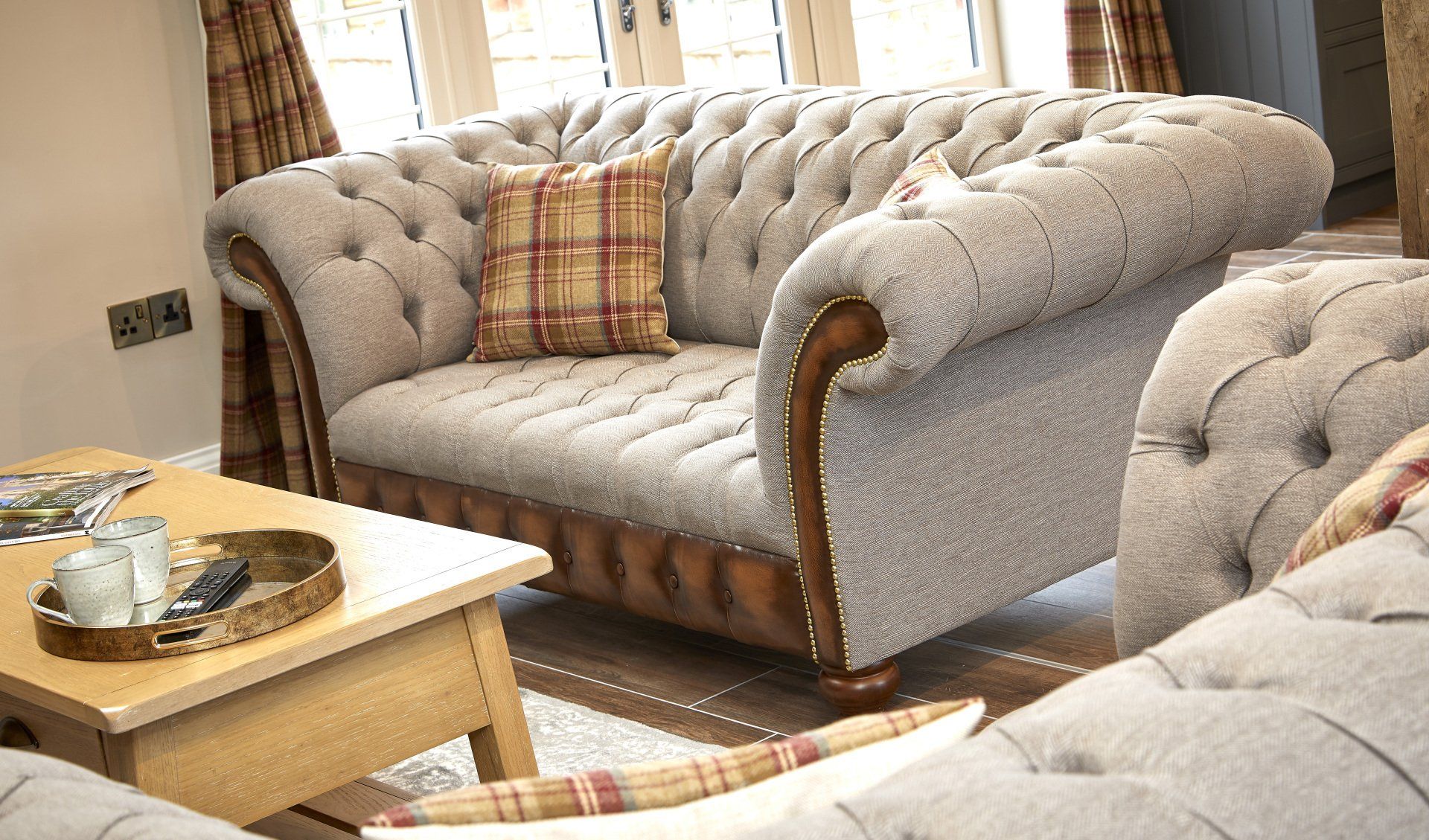A living room with two couches and a coffee table
