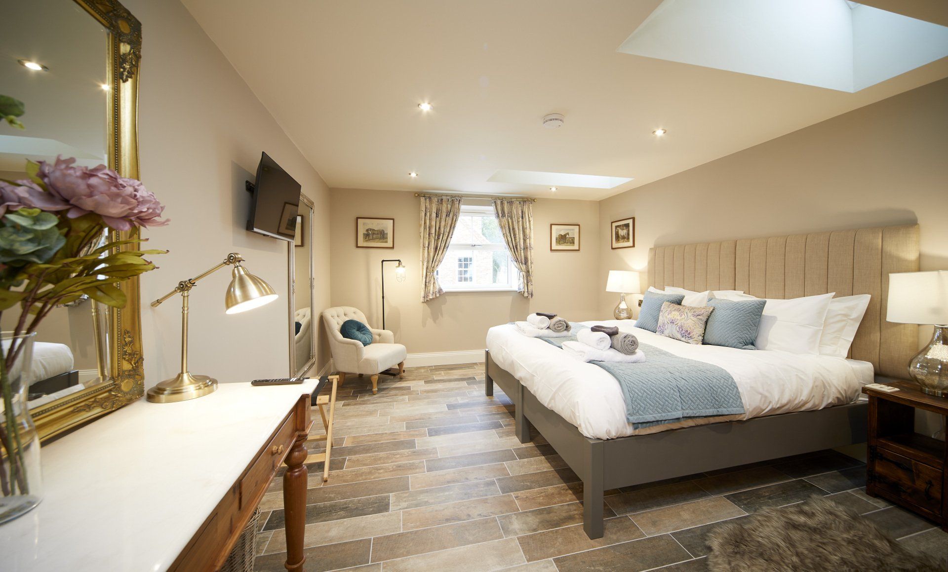 There is a large bed in the middle of the room.