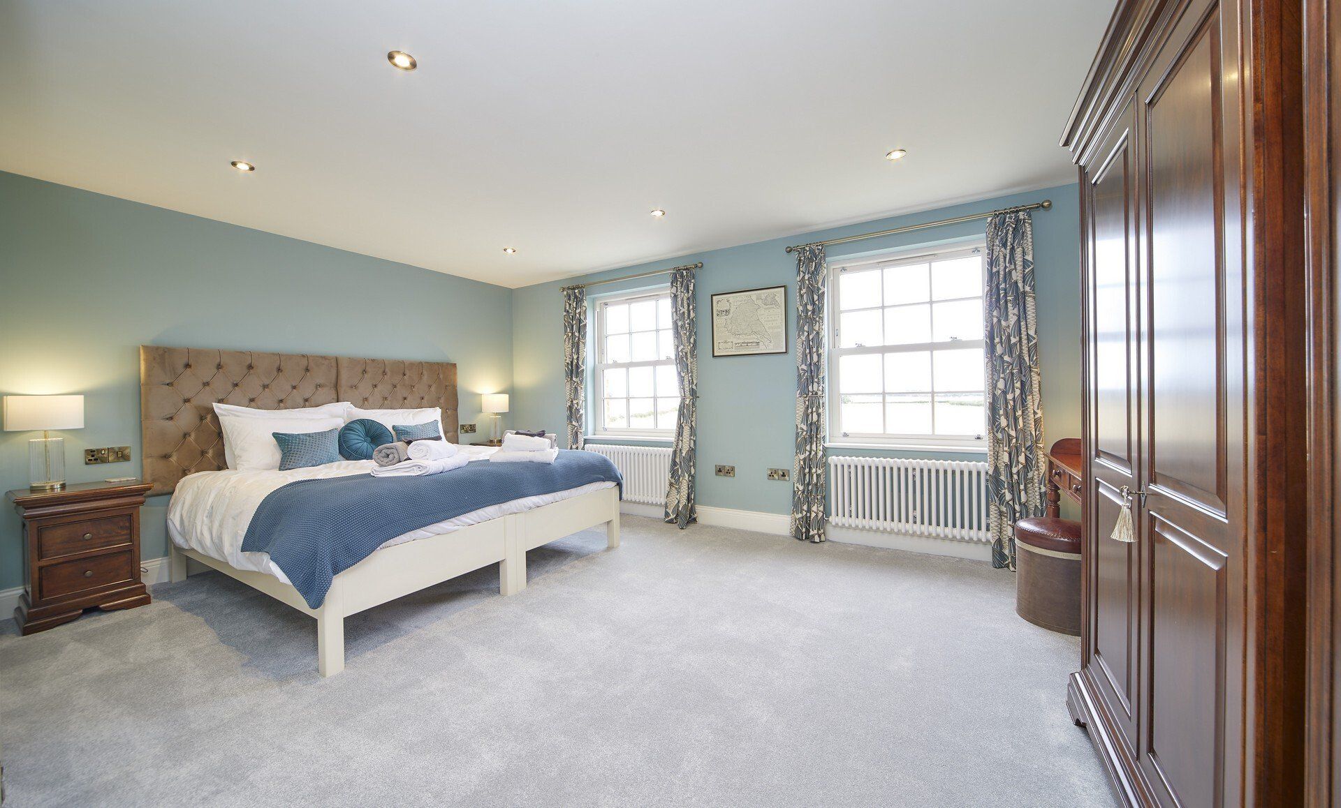 There is a large bed in the middle of the room.